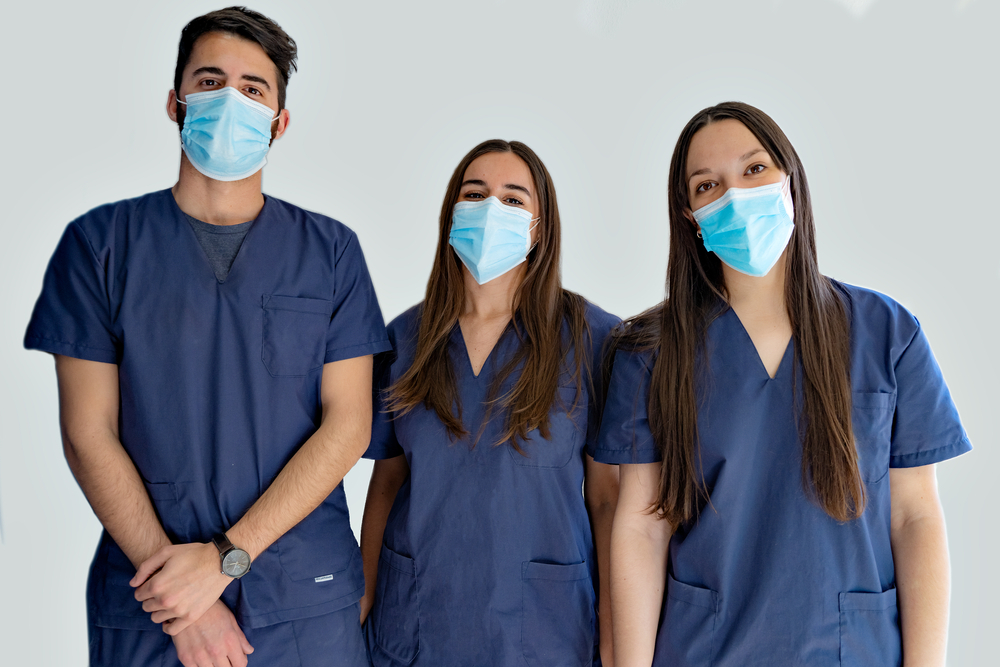 Male & Female Nurses Wearing Scrubs