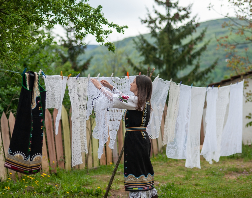 A Girl Washing Embroidery Clothes